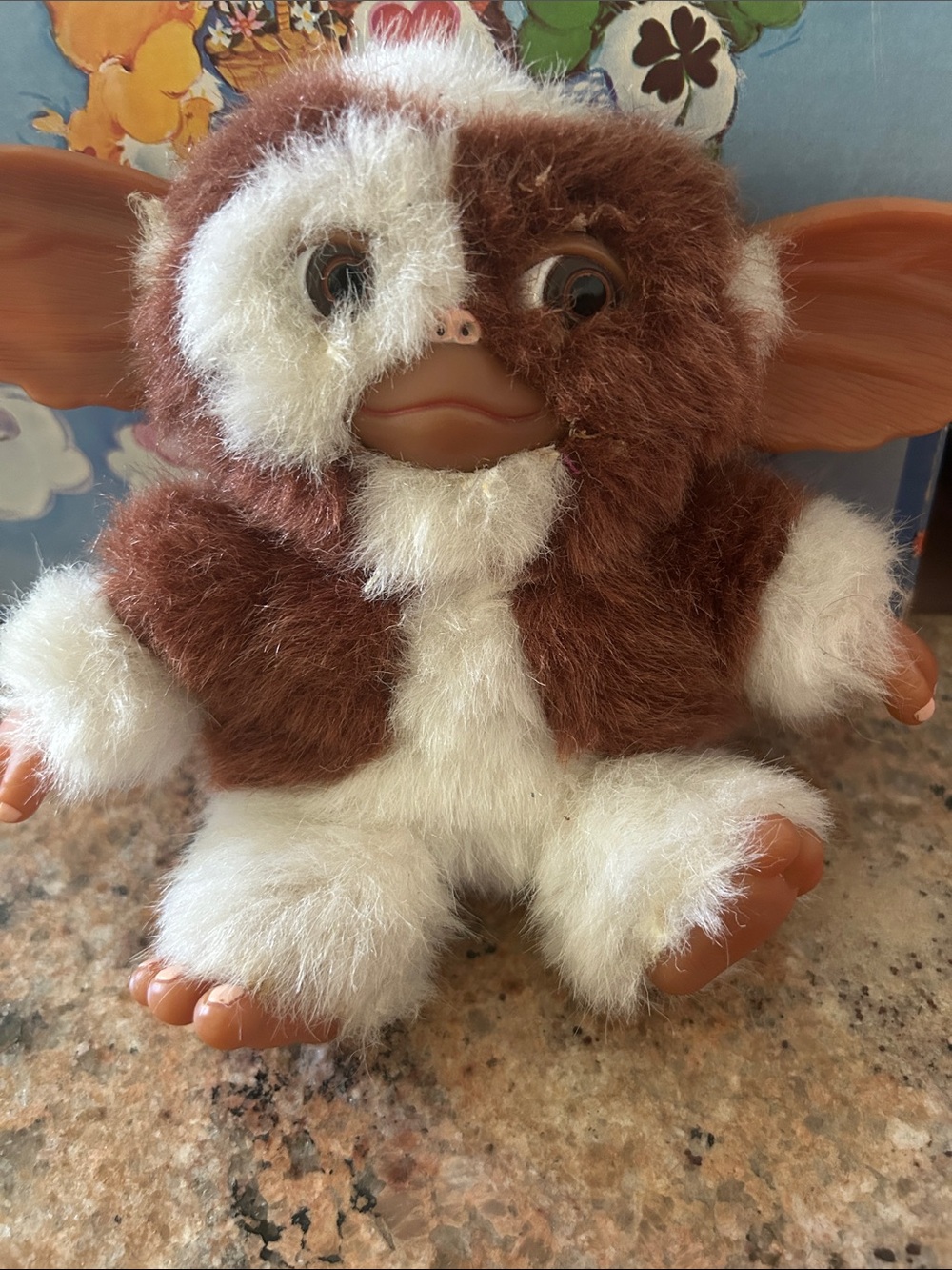 Gizmo Neca Plush, has glad spots around eyes and mouth